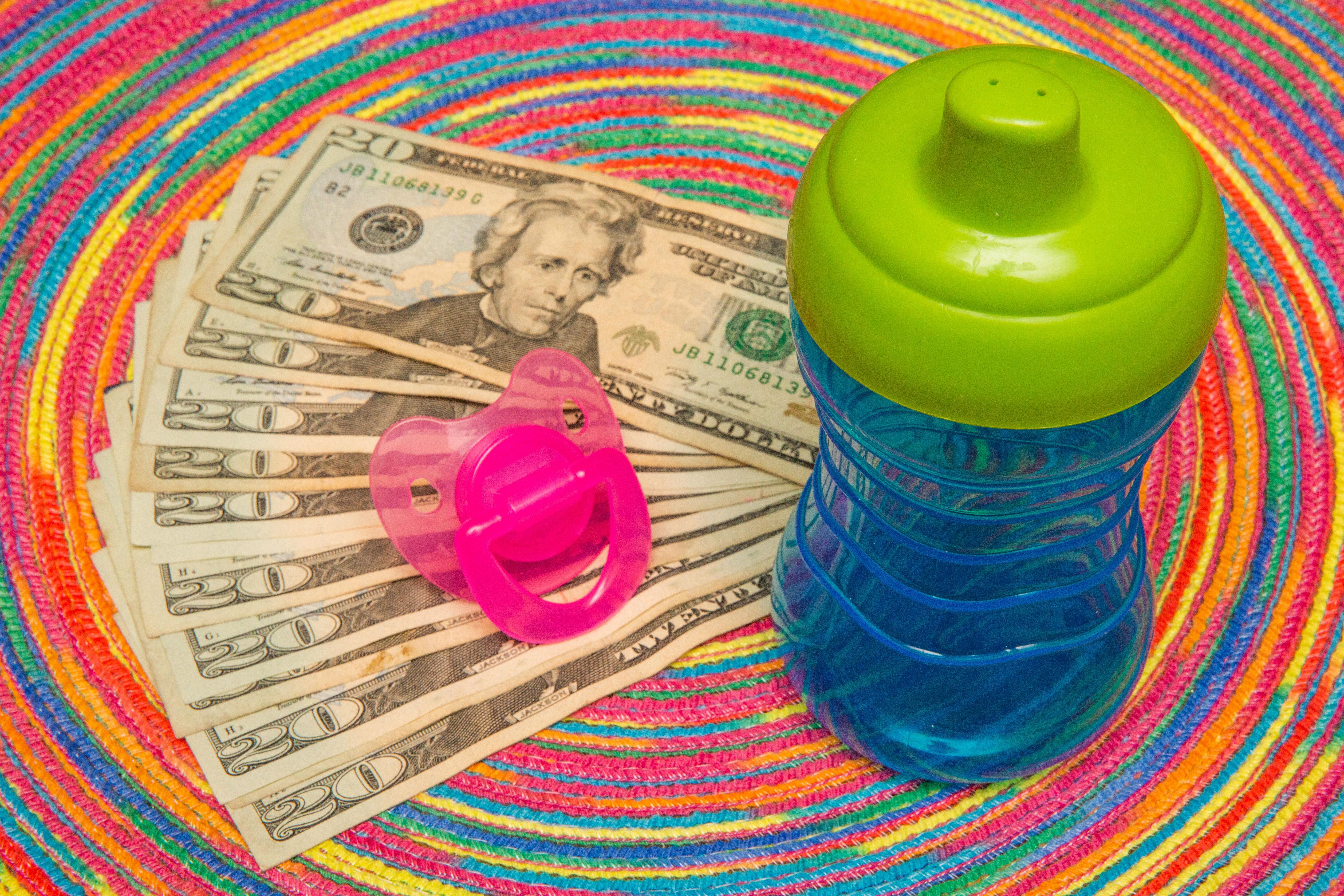 001-cash-stimulus-child-tax-credit-3600-calculator-cnet-2021-2020-federal-government-money-baby-family-pacifier-sippy