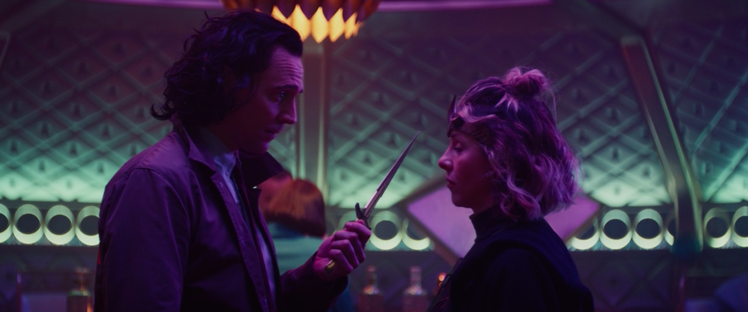 Loki and Sylvie with knife